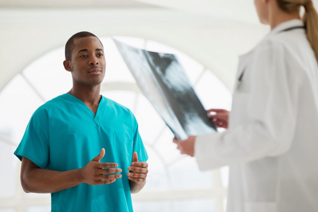 Two doctors looking at xray